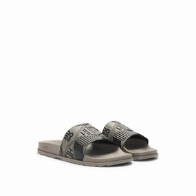 Italian-made slides with mixed logos Minitonka Slippers