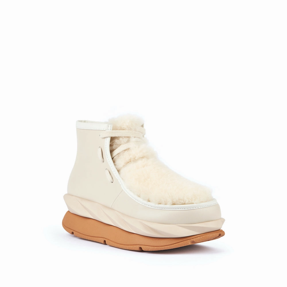 MELLOW WABOO CREAM Schutz Snake Ankle Boots